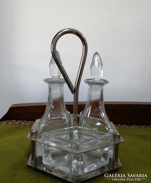 Table vinegar-oil bottle in a metal holder