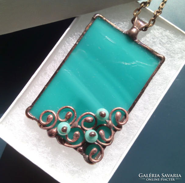 Special handcrafted glass pendant made of turquoise glass