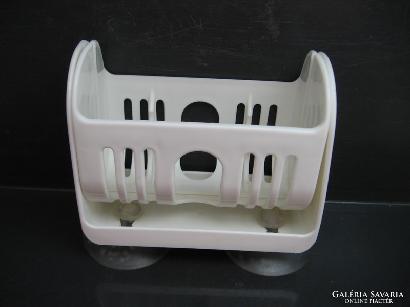 White plastic soap holder that can be installed on three sides