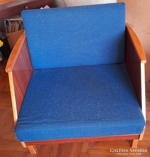 Retro armchair with wooden arms