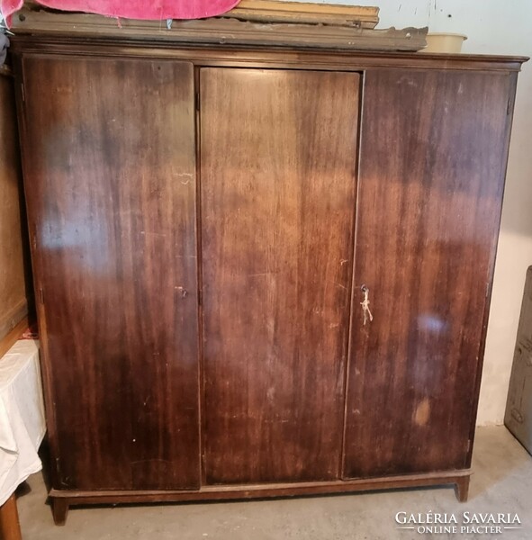 Three-door, home furniture factory cabinet from the 50s.