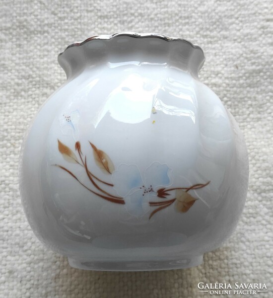 Apulum porcelain vase with a small defect, which seems to be a factory defect