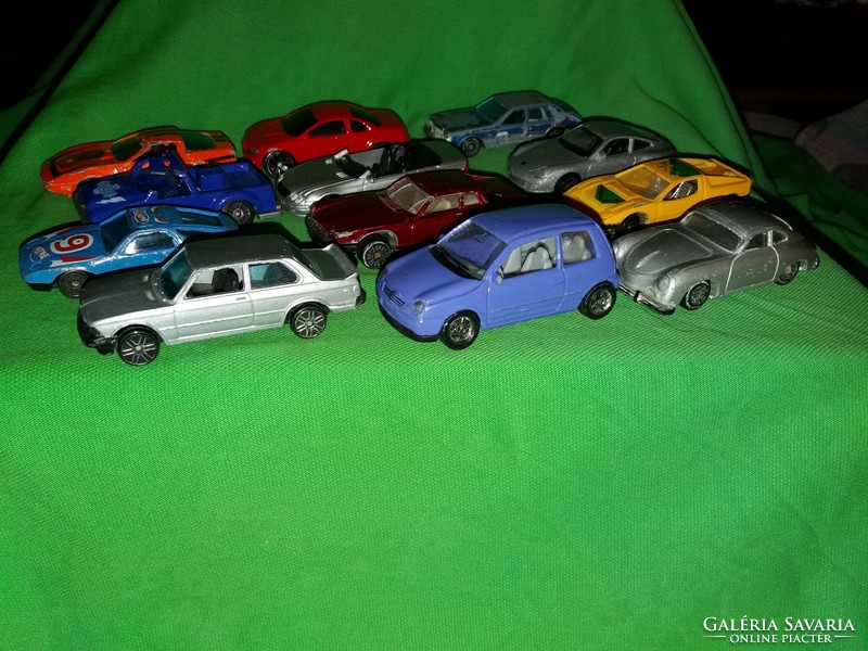 Old toy car package in good condition with 12 metal and plastic toy cars as shown in the pictures
