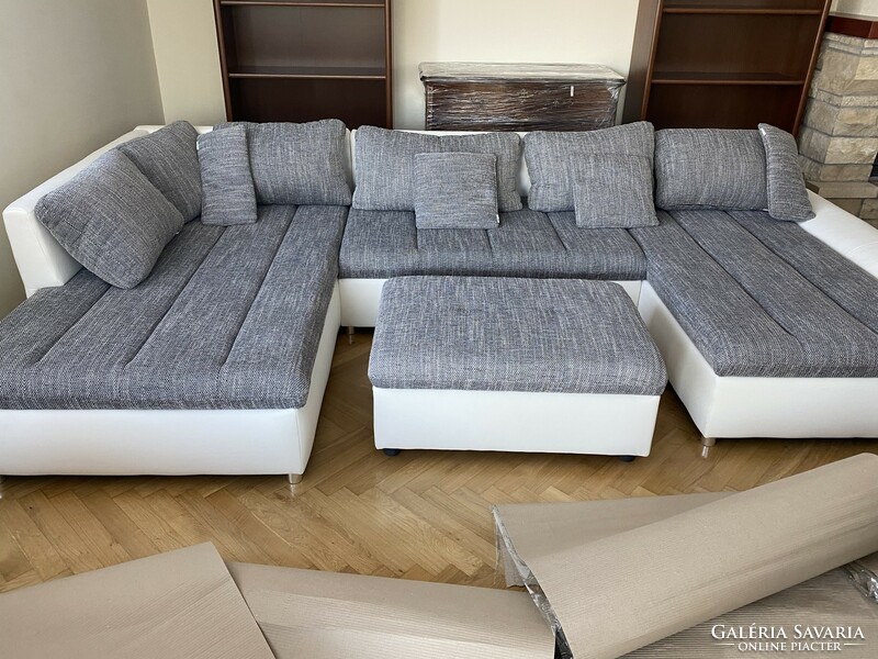 Spectacular, large-sized sofa set. It is also big enough for lying down. With cushions and ball holder. Very nice gray