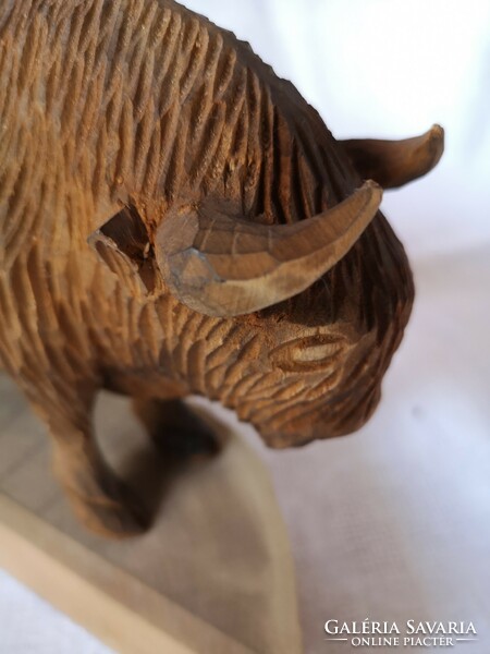 Wood carving: bison statue
