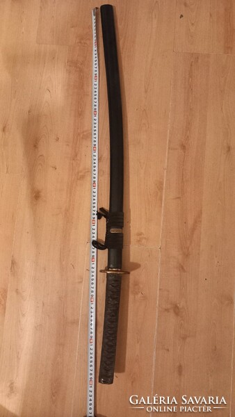 A samurai sword from the 1980s, with a hardened steel blade, not crap