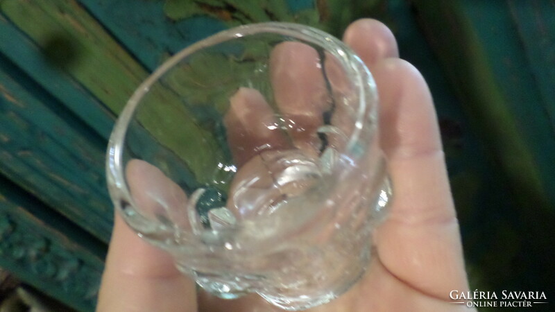 2 pressed glass cups in the shape of a skull, in good condition.