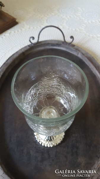 Glass candle holder and candle holder with a fluted base