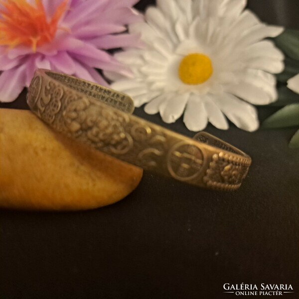 Silver-plated craftsman bracelet.