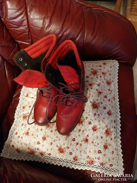 Red, used, high-heeled lace-up leather shoes