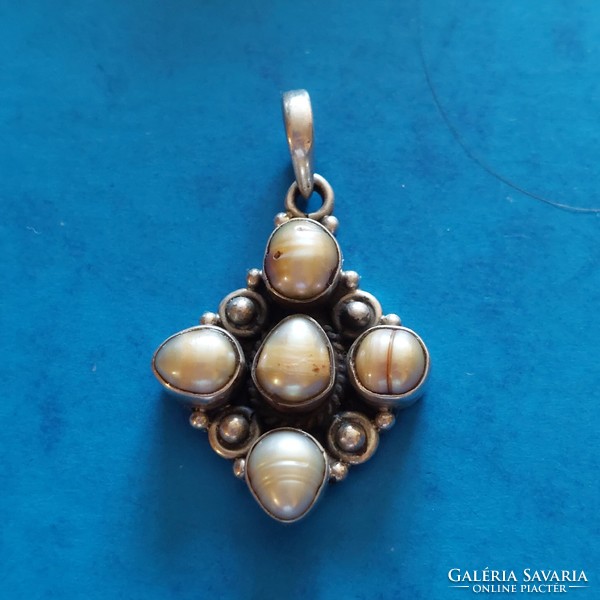 Old silver pendant with real pearls