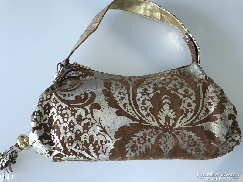 Italian braccialini leather shoulder bag on a medium brown base with an antique gold printed pattern