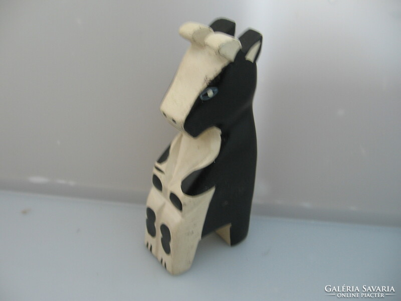 Wooden carved cow figure
