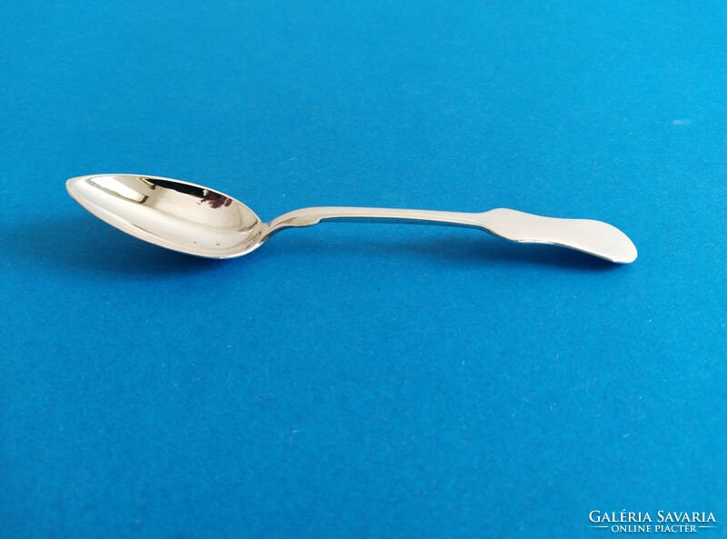 Silver tea spoon in violin style
