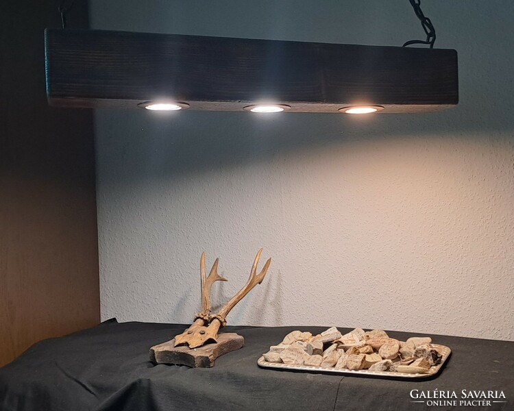 Ceiling beam lamp made of burnt wood