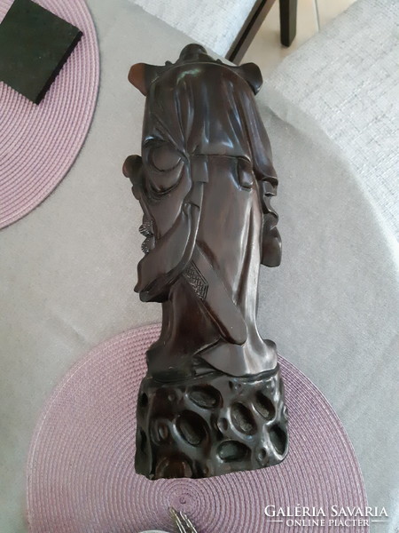 Eastern mythological figure made of hardwood