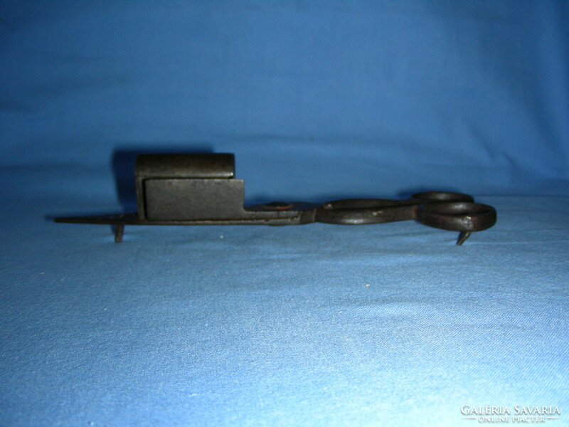Antique wrought iron candle knocker