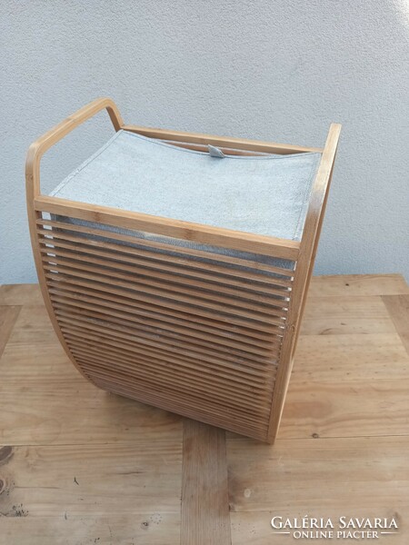 Bamboo laundry basket is negotiable.