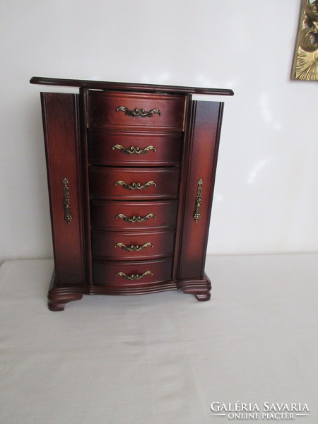 Old, solid wood, huge jewelery storage cabinet. Negotiable!.