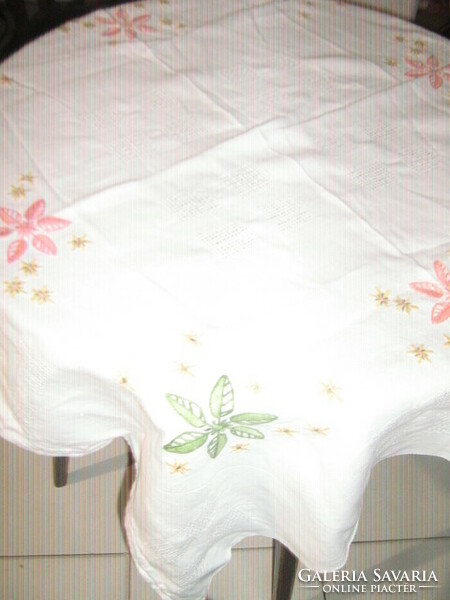 Beautiful hand-embroidered snow-white tablecloth