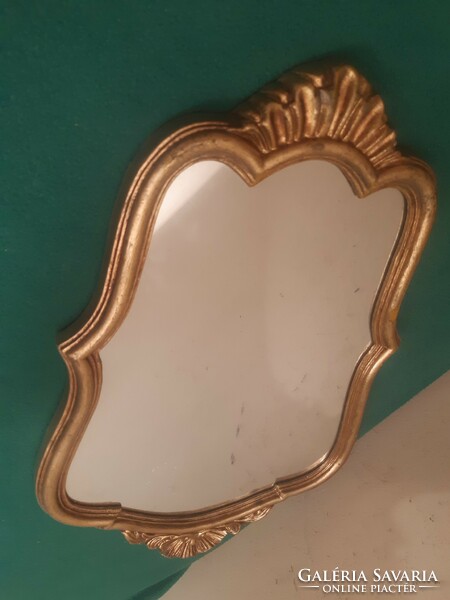Beautiful gilded mirror