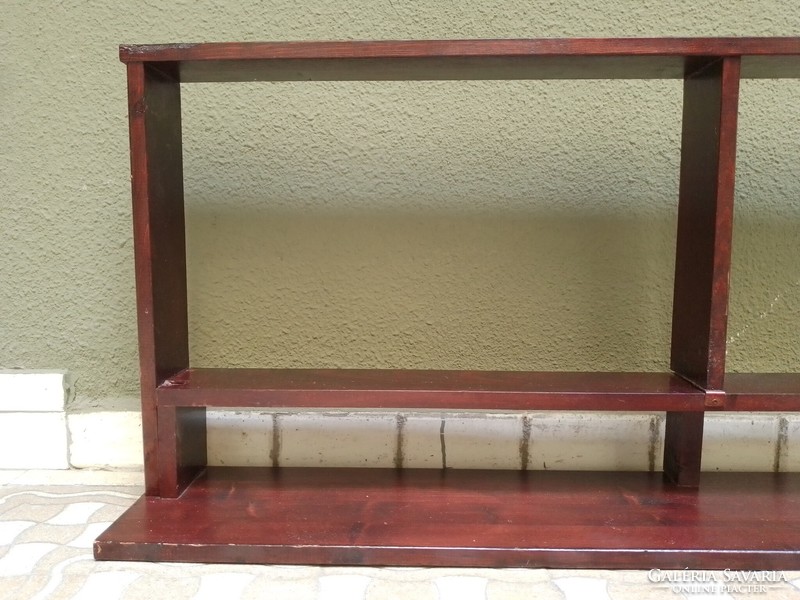 Unique wooden wall shelf stained mahogany color