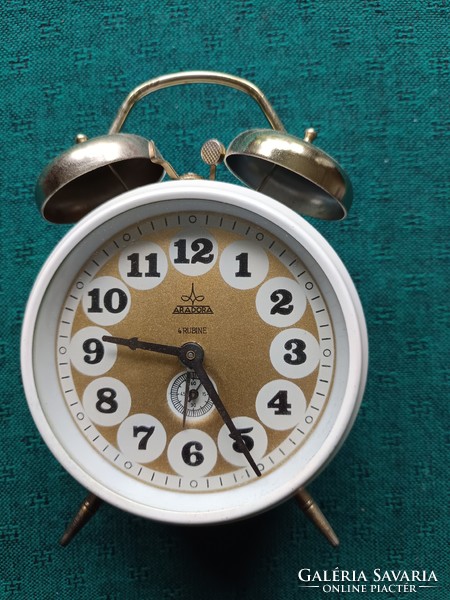 Old mechanical alarm clock in new condition