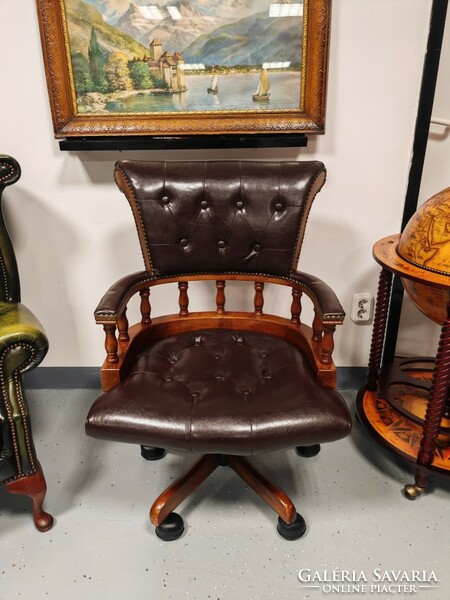 Classic chesterfield type faux leather swivel captain's chair