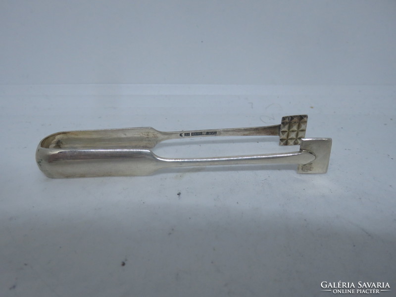 Silver Finnish ice cube tongs.