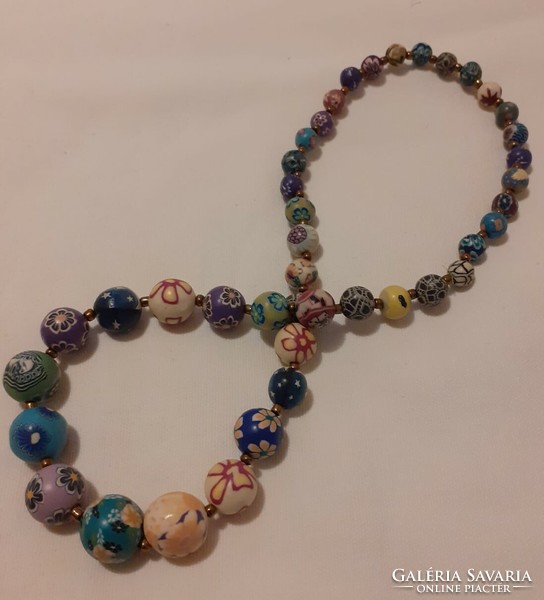 Showy, fun, colorful necklace with growing eyes