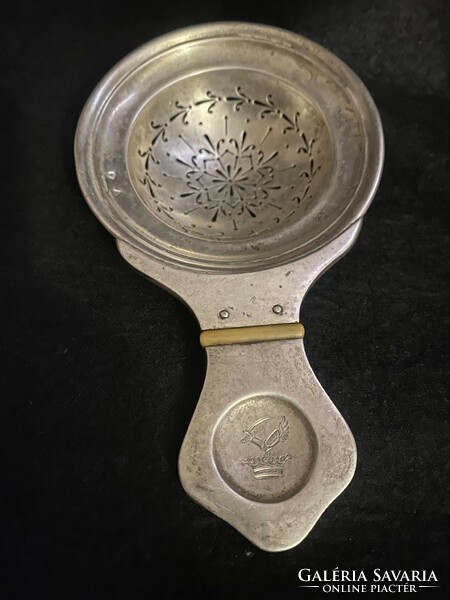 Silver antique tea strainer 105 grams.