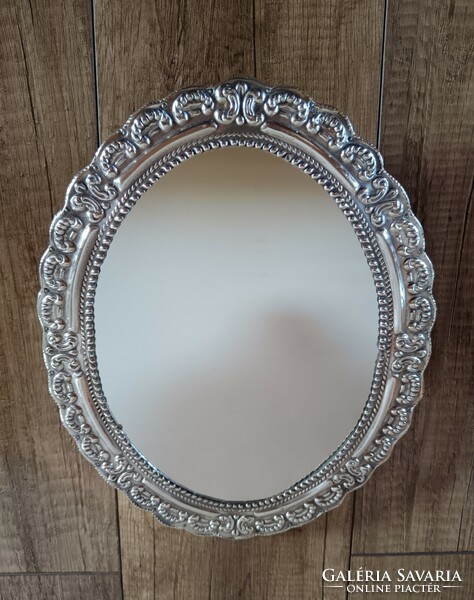 Old silver framed wall mirror