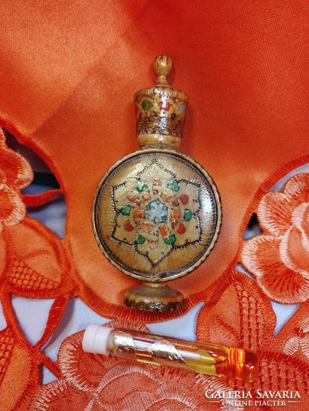 Original Bulgarian rose oil in a decorative wooden holder