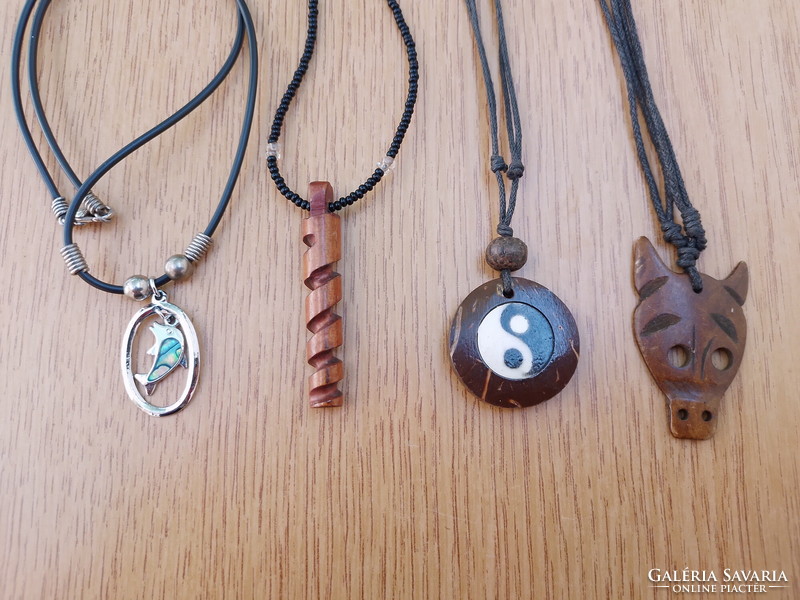 New figurative necklace on leather strap (yin-yang, dolphin, fox, threaded wood)