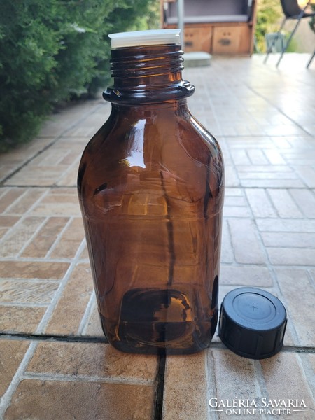 Large amber medicine bottle.