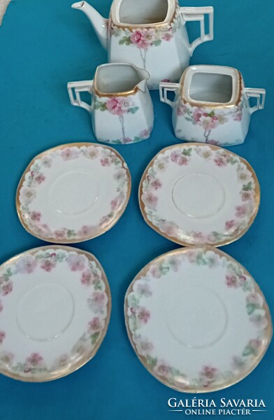 From a foreign painted tea set: milk jug with sugar and 4 plates