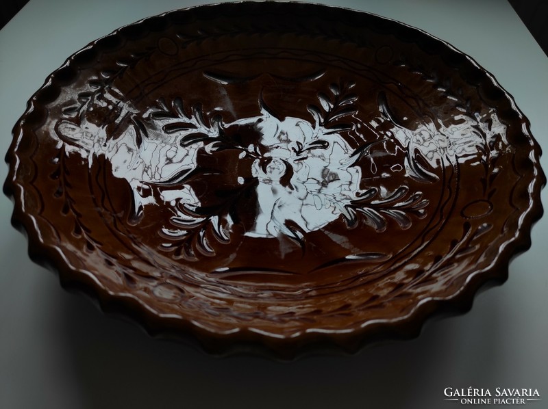 Brown glazed folk ceramic wall bowl