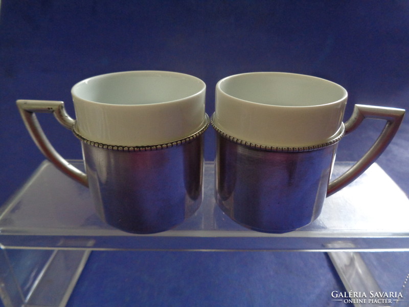 Pair of antique silver coffee cups