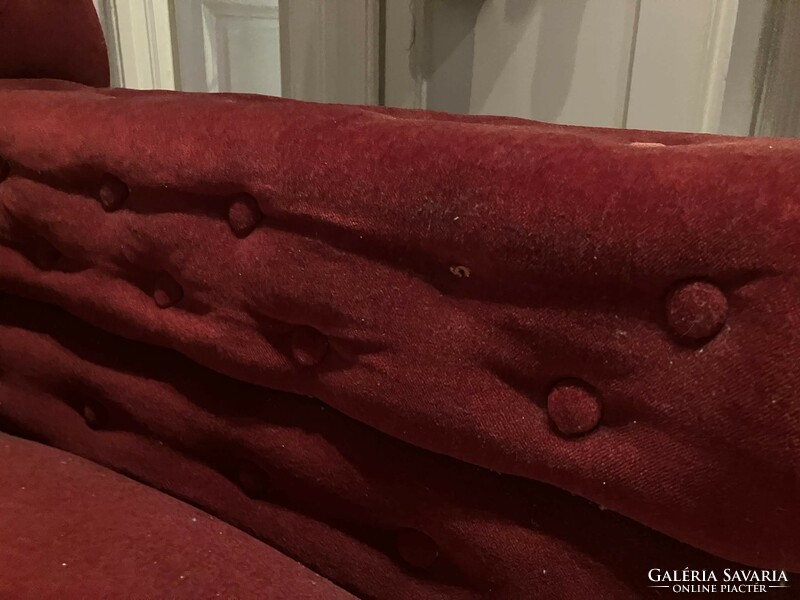 Antique burgundy carved sofa