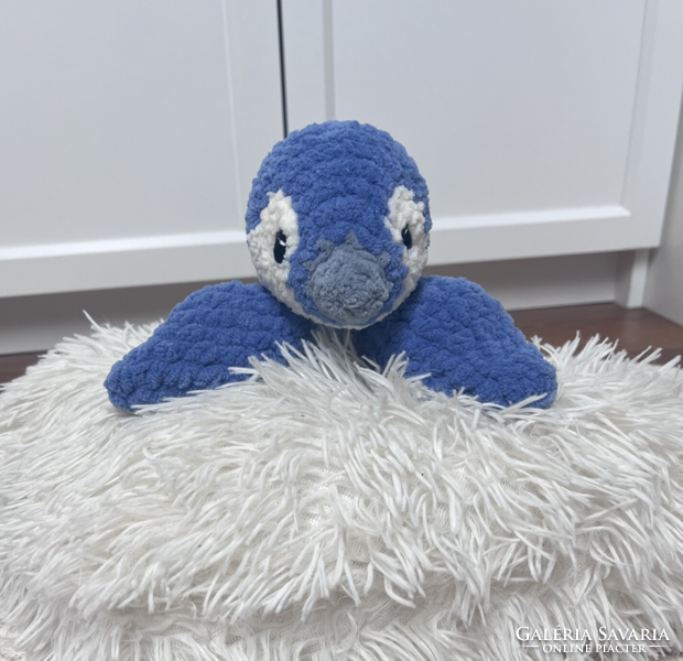 Crocheted plush penguin sleeper
