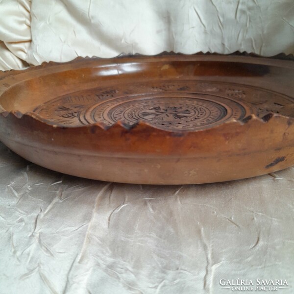 Carved wooden plate