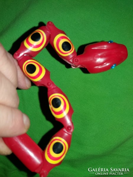 Retro traffic goods bazaar coiling plastic snake red 25 cm long according to the pictures 1.