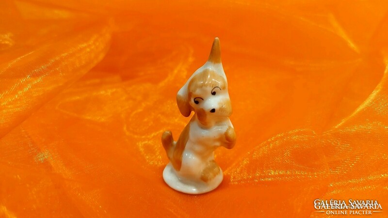Aquincum porcelain dog figure.