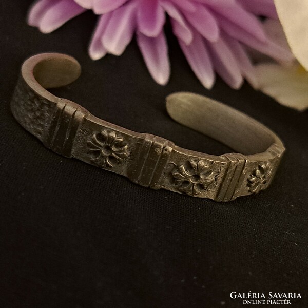 Silver-plated craftsman bracelet.