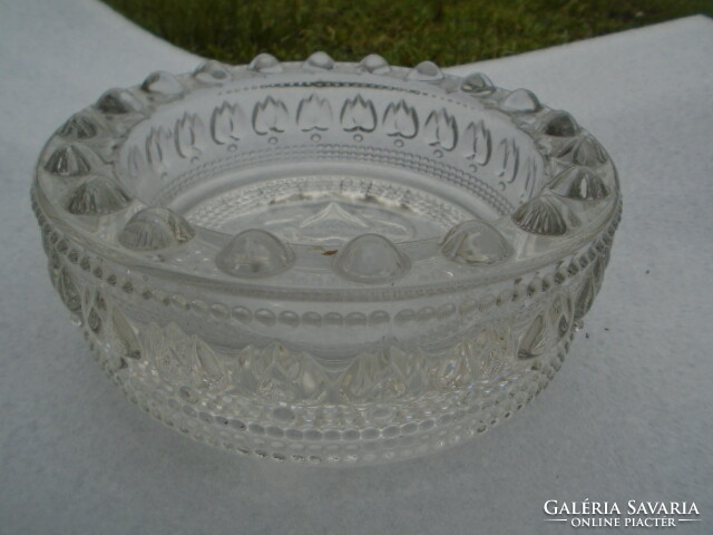 A circle made of crystal glass with Kosta&boda sommerso technology has a tulip pattern or more ornaments