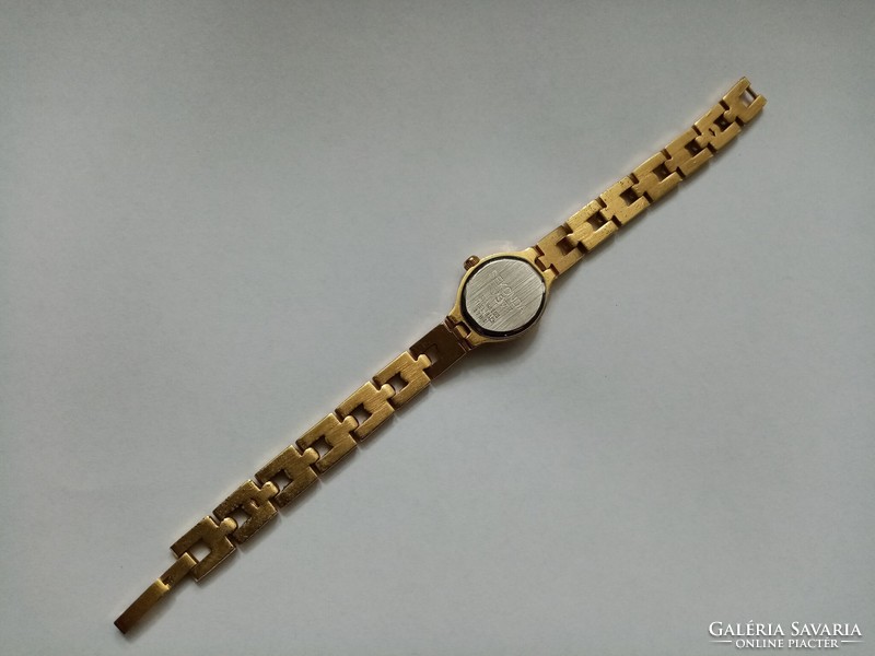 For sale, a vintage gold-colored seconds women's watch