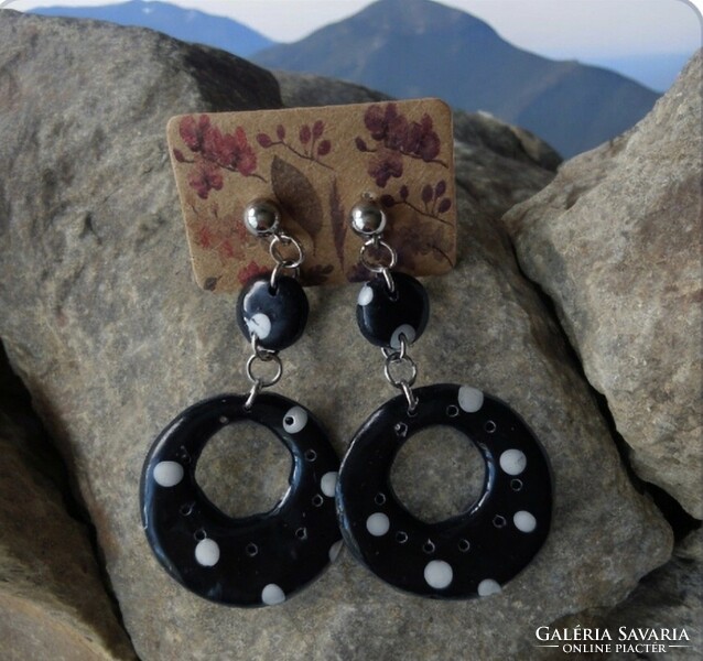 Black and white polka dot logo earrings