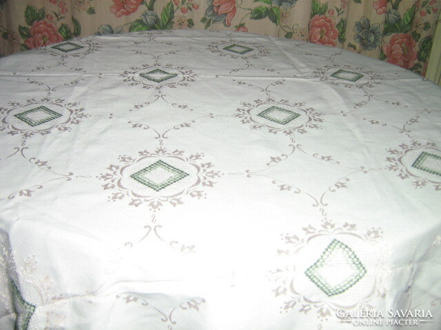 Beautiful delicately embroidered damask tablecloth