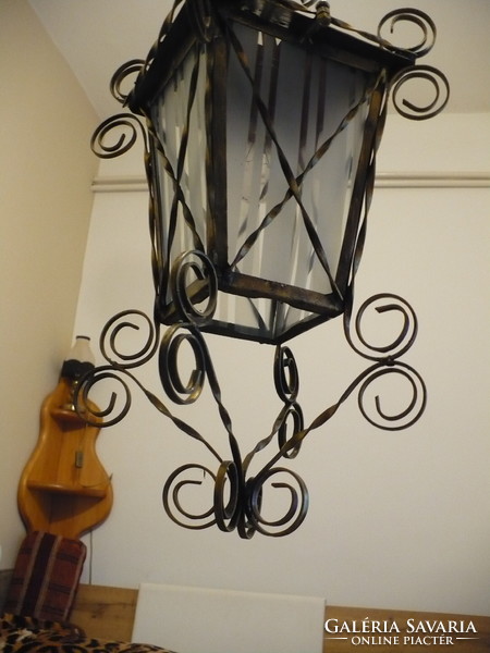 Antique wrought iron ceiling lamp.