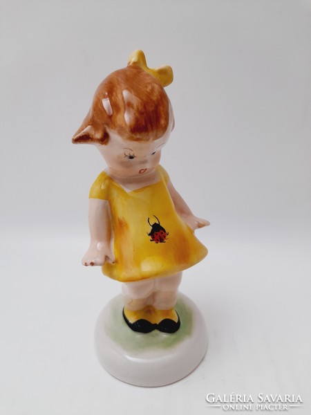 Bodrogkeresztúr ceramic figure, ladybug girl in a yellow dress